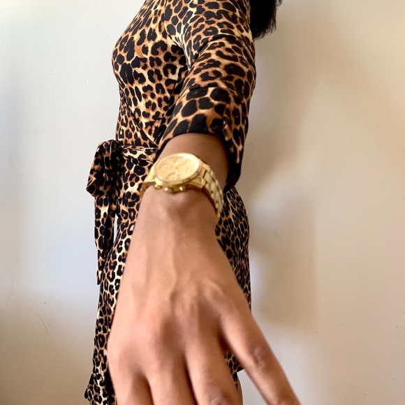 Dresses & Skirts - ✨🔶🔸LEOPARD PRINT WRAP DRESS 🔸🔶✨ ANOTHER STORY